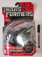 Front of sealed packaging showing Decepticon Brawl figure and branding