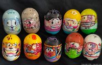 Front view of ten Mighty Beanz showing character graphics