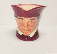 Front view of Royal Doulton “The Cardinal” jug