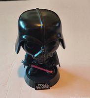 Front view of Darth Vader Pop! on base
