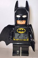 Front view showing LCD display and Batman design