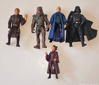 All five Star Wars action figures arranged side by side