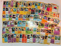 Wide shot of entire spread of Pokémon cards