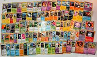 Overview of entire spread of roughly 100 Pokémon cards