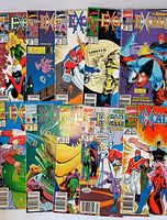 All 12 Excalibur comics laid out showing covers