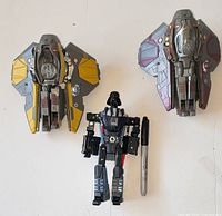 All three Star Wars Transformers toys laid out