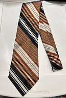Front view of entire necktie showing full pattern