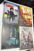Front covers of all four movie cases