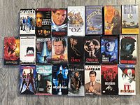 Top-down view of 20 tapes laid flat, showing front artwork