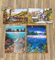 All four framed puzzles displayed together on floor