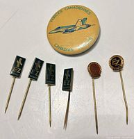 All seven pins laid out front view