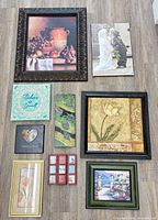 Group shot of all nine wall art pieces arranged on floor