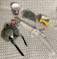 All six items laid out on crocheted surface
