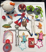 Full group shot of all toys on white background