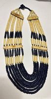 Full view of necklace showing multi-strand design and color scheme
