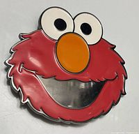 Front view of Elmo belt buckle showing enamel colors and overall design