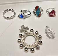 All six jewelry pieces laid out