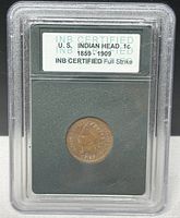 Front view of INB slab containing 1903 Indian Head cent with label visible