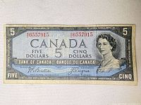 Front view of 1954 Canadian $5 bill showing full design and serial number