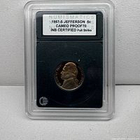 Front view of INB slab showing obverse and certification label