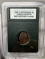Front view of INB slab showing labeled 1992-S Jefferson Nickel proof coin