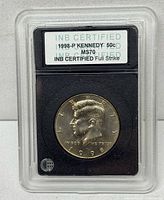 Full slab showing INB certification label and obverse of coin