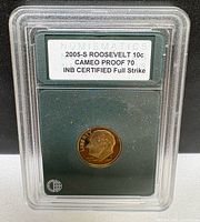 Coin in INB slab showing grading label