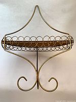 Front view showing metal frame design and Formica insert