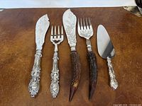All five serving utensils laid out