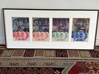 Full view of framed quadriptych showing four prints