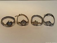 Group shot of four Bulova women’s wristwatches lined in a row