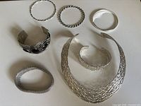 Group shot of all seven jewelry pieces
