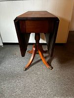 Leaves down view showing overall form, drop leaf sides folded