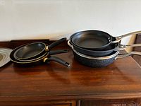 Stacked pans showing variety and sizes