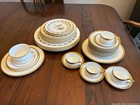 Overview of three pattern groups: Summer Morning place setting, Selb-Bavaria Donatello stack, Royal Worcester Bernina stack