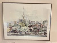Full view of framed Toronto skyline print in silver frame