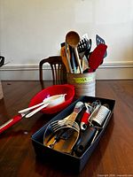 Overall lot with utensil holder, colander, strainers and tray of small tools