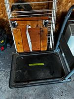 All three items together: furniture dolly in front, laundry rack behind, trolley base beneath