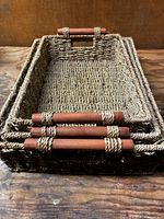 Three baskets stacked to show nesting and handles