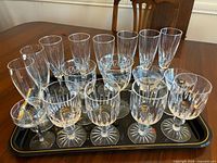 Group shot showing all 18 glasses on black tray
