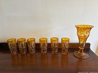 Full set showing six tumblers and pitcher