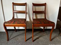 Full front view of both wooden chairs