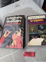 Both astronomy books side by side