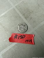 Reverse side with Canadian coat of arms