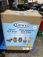 Front of sealed Graco 4Ever DLX Grad car seat box