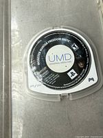 UMD disc for Monster Hunter Freedom Unite in plastic PSP case