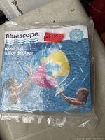 Front view of sealed Bluescape beach ball package showing brand, size 30 in / 76 cm
