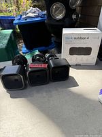 Three Blink Outdoor 4 cameras with mounts and box