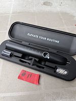 toothbrush handle and accessories in open case