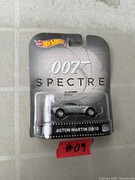Front view of sealed Hot Wheels 007 Spectre Aston Martin DB10 blister card